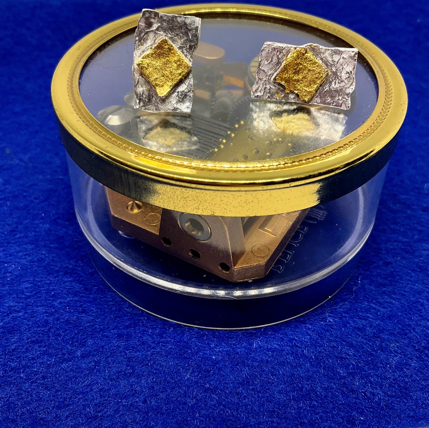 Warm and Luxurious Silver and Gold Ear Studs