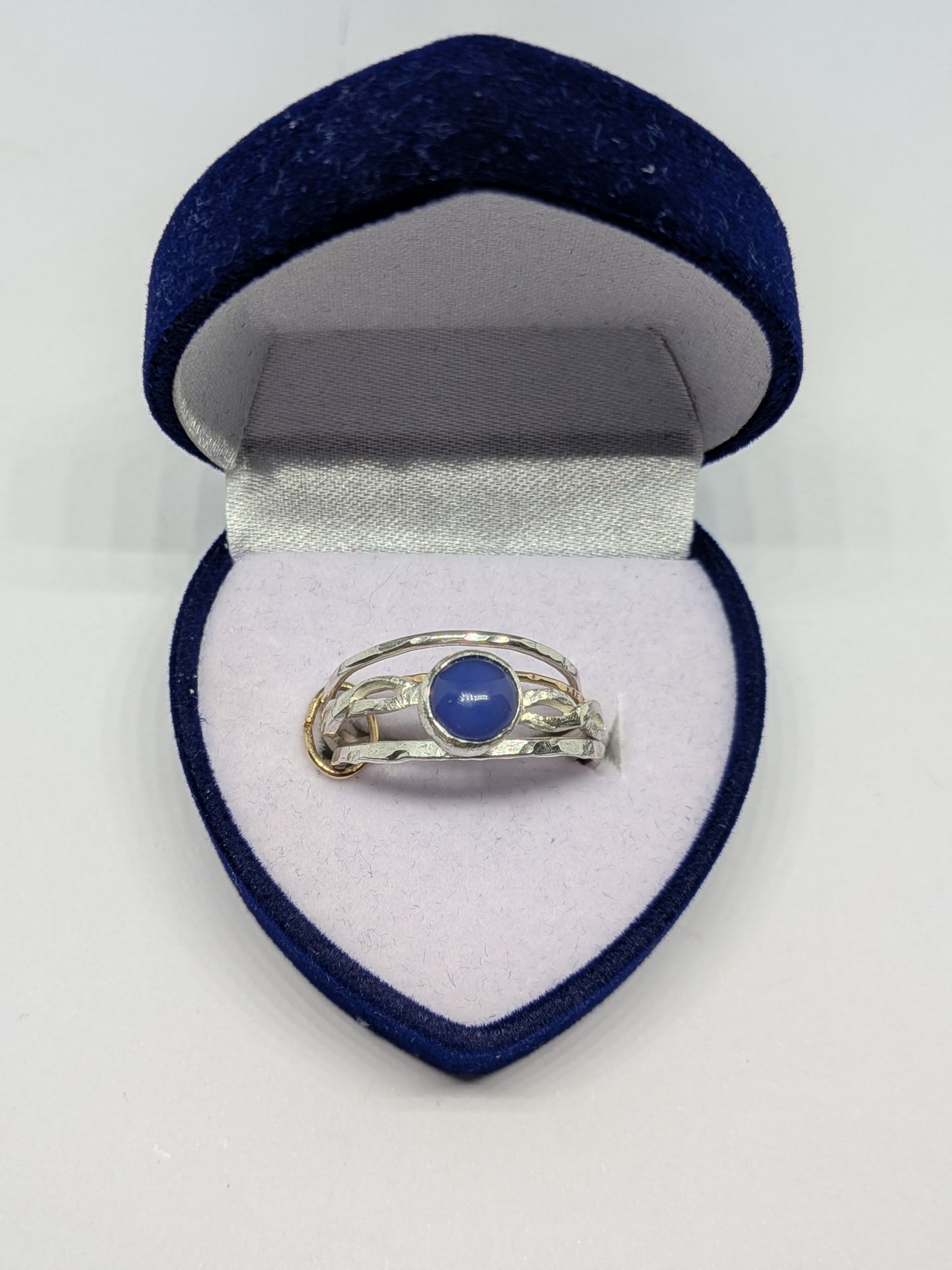 Silver and Gold Stacking Rings tanzanite cabochon setting.