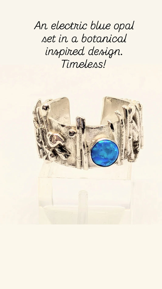 Electric Blue Opal set in Botanical Inspired Silver Ring.