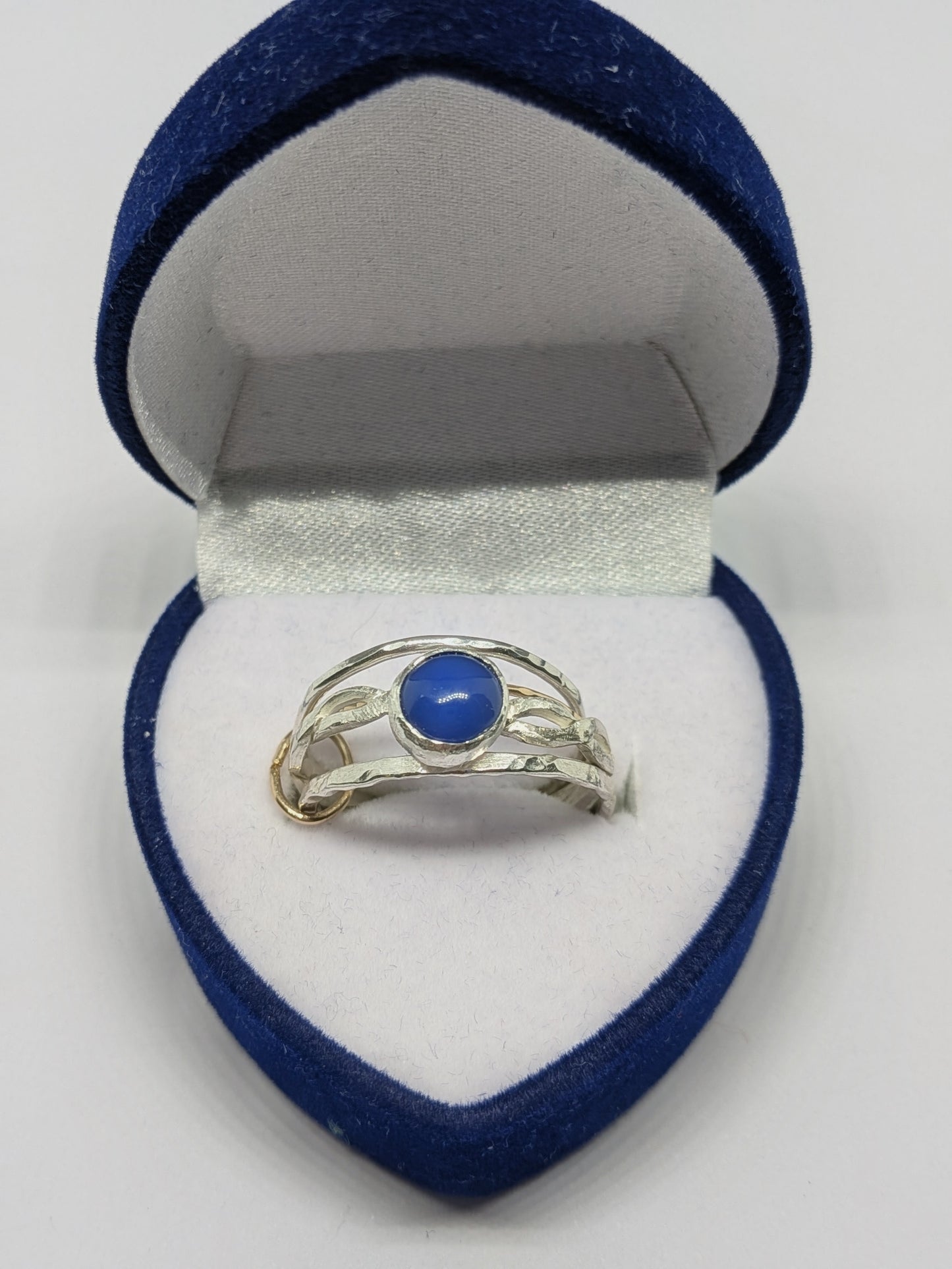 Silver and Gold Stacking Rings tanzanite cabochon setting.