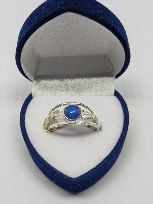 Silver and Gold Stacking Rings tanzanite cabochon setting.