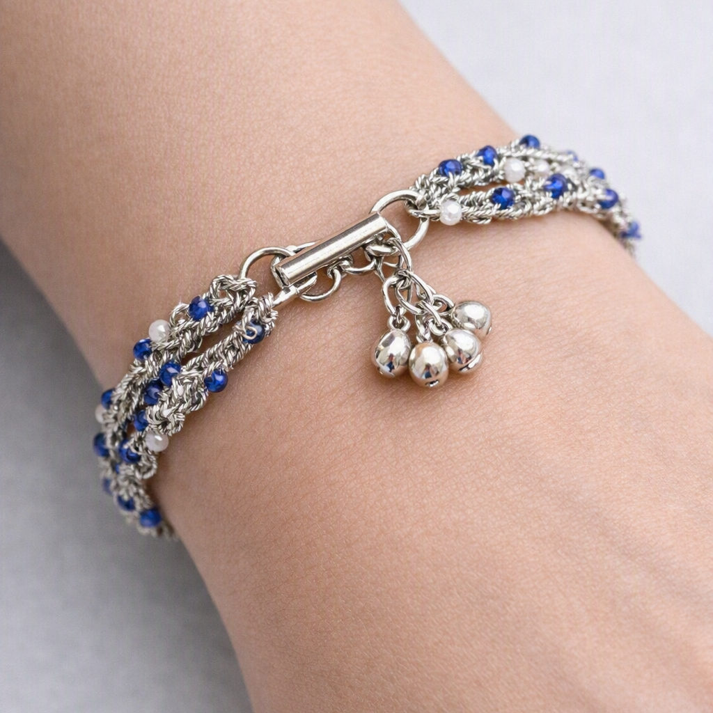 Bracelet woven in silver thread.