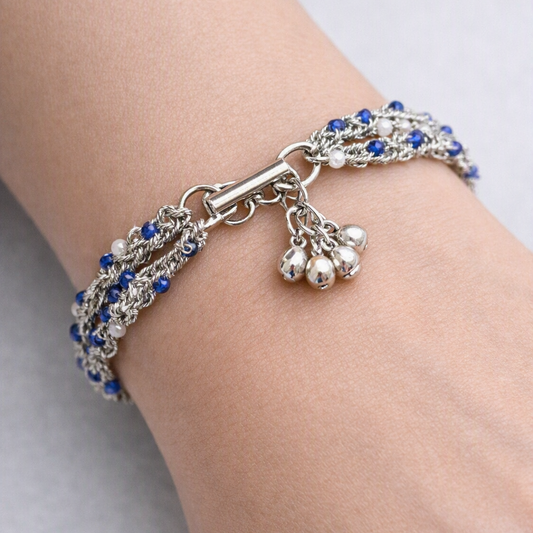 Bracelet woven in silver thread.
