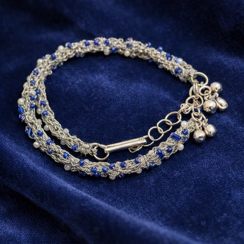 Bracelet woven in silver thread.